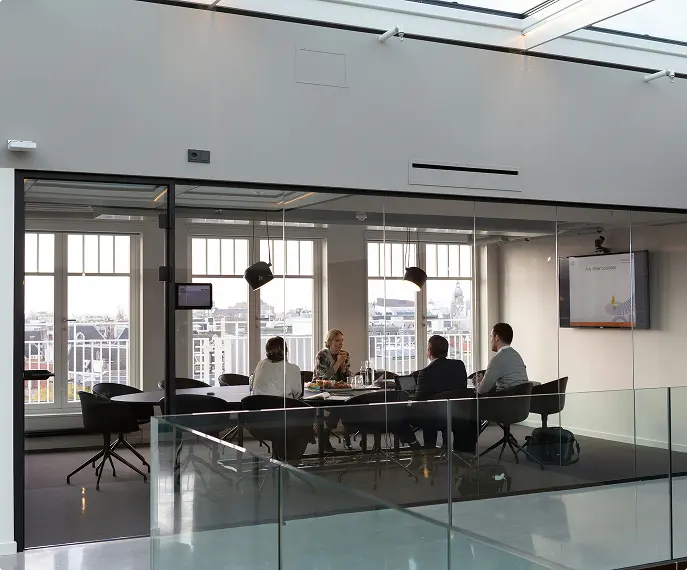 Team meeting interior of Pitcairn's office