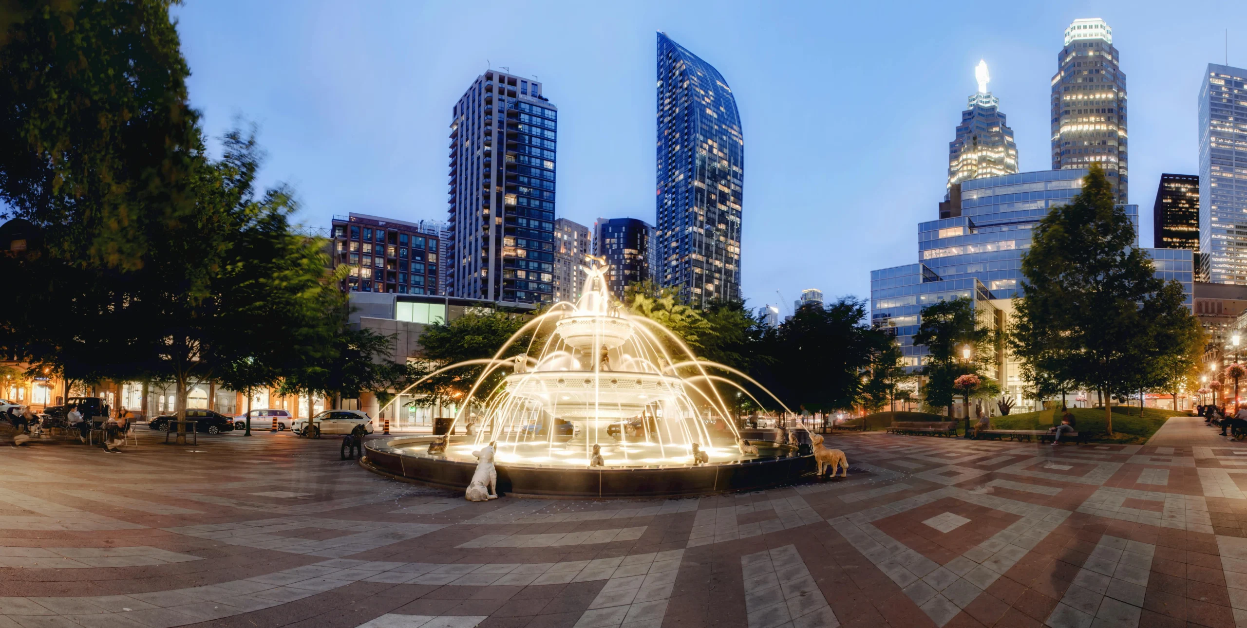 Dilworth Park fountain and the Philadelphia skyline at dusk