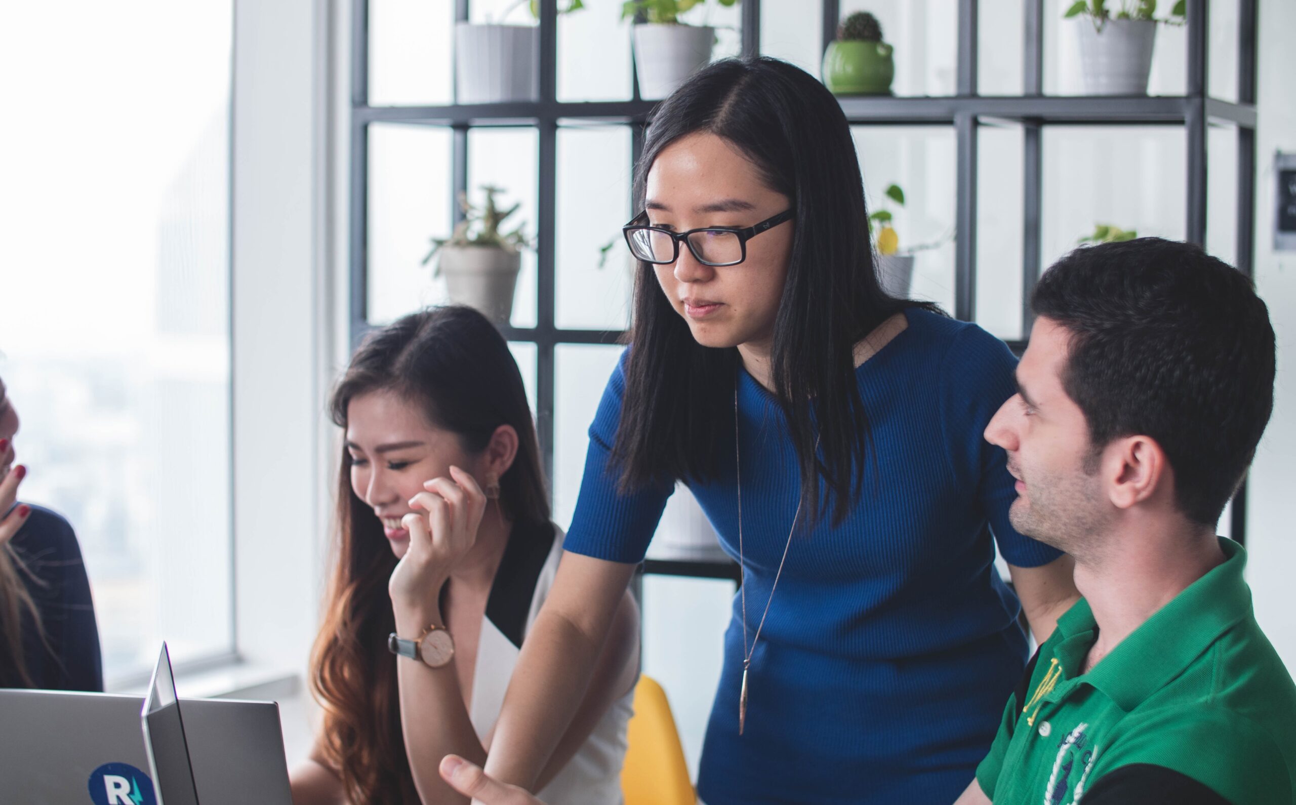 A business team working together on complex wealth management accounts